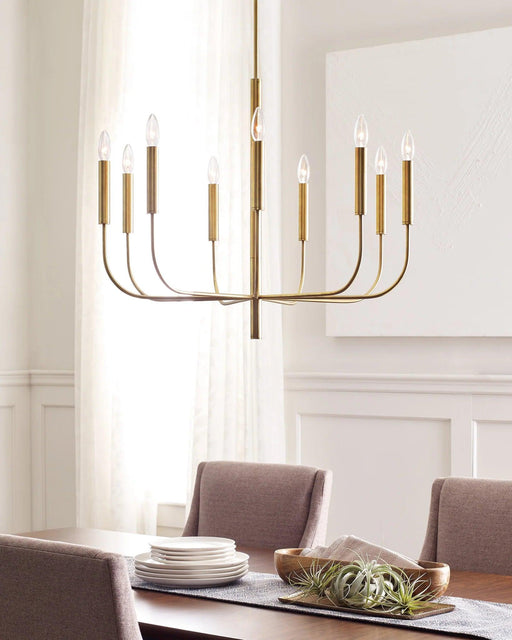Distressed black and brass modern circular ceiling light with six spherical clear glass shades, in a room setting.