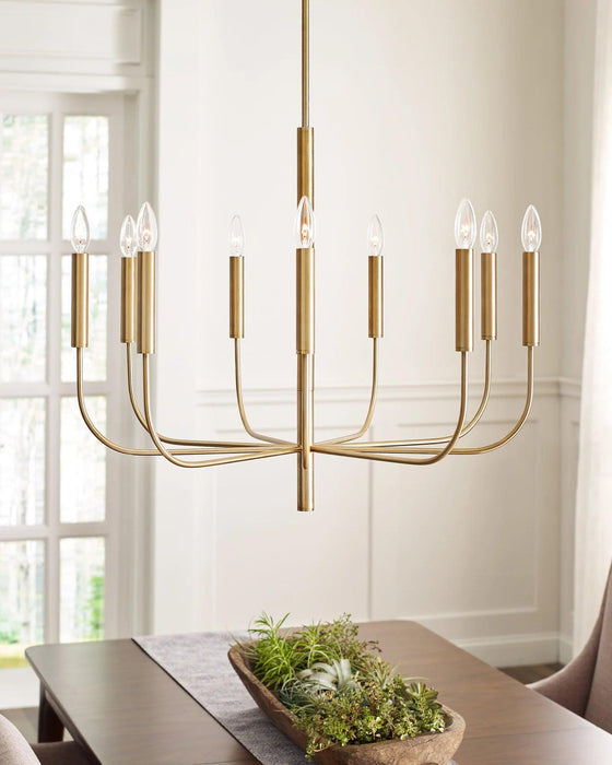 Distressed black and brass modern circular ceiling light with spherical clear glass shades, in a room setting.