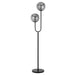 Black floor lamp with a rectangular base and a clear, rectangular light panel.