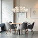 Large, modern wall sconce with a rectangular, metallic frame, angled view.