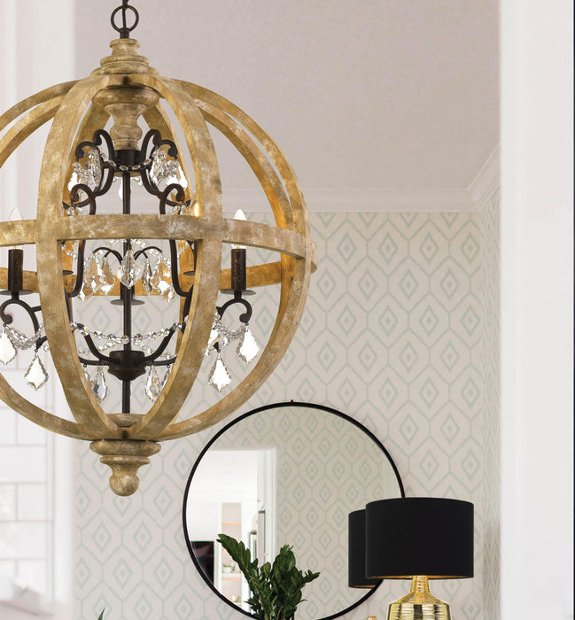White five-light pendant with conical shades, illuminated.
