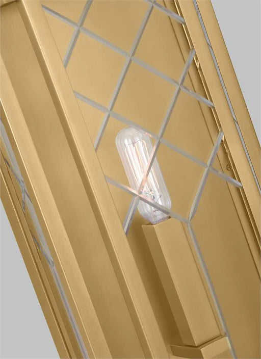 A close-up of a brushed steel modern flush mount light showing the circular design and integrated LED.