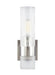 Polished nickel modern cylindrical ceiling light with a white interior.