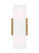 A modern satin brass bathroom vanity light with three cylindrical white glass shades.