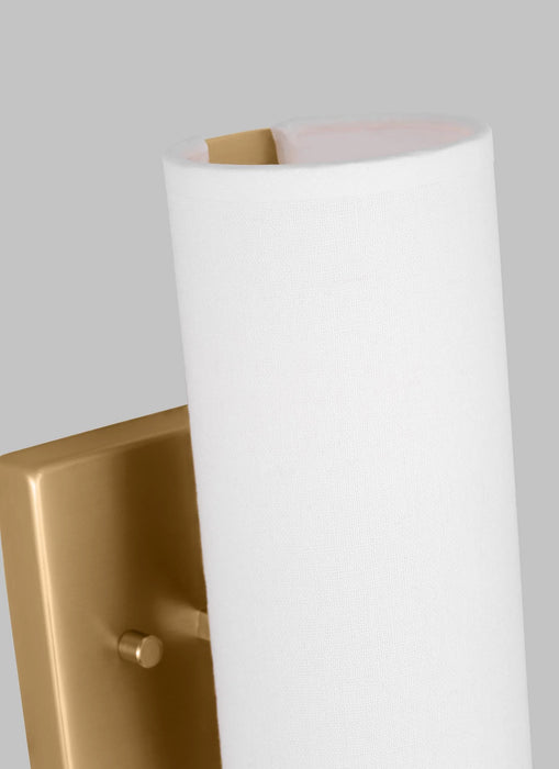 A close-up of a satin brass modern bathroom vanity light.