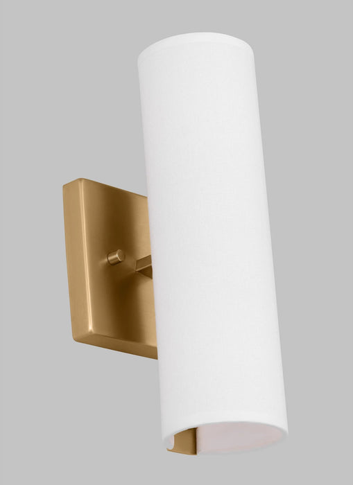 A side profile of a modern satin brass bathroom vanity light showing the cylindrical shades.