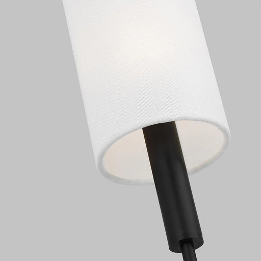 A close-up of a modern aged iron ceiling fan showing the light kit.