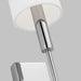 A close-up of a modern polished nickel ceiling fan showing the light kit.