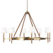 Textured white and brass modern linear ceiling light with eight cylindrical shades.