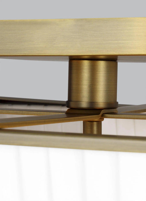Textured white and brass modern floor lamp with a bell-shaped shade, detailed view.