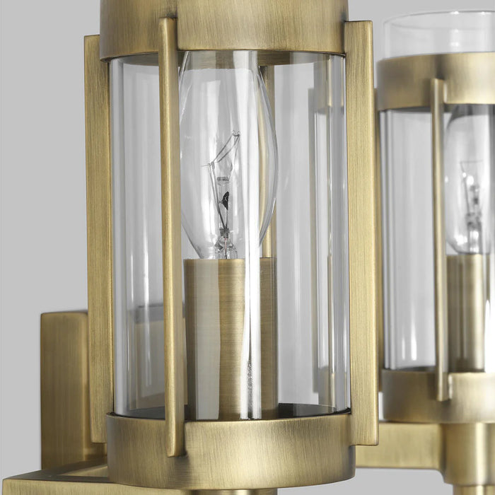 A close-up of a modern semi-flush mount light highlighting its distressed white bronze rings.