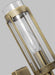 Textured white and brass modern wall light with a wide dish shade, detailed view.