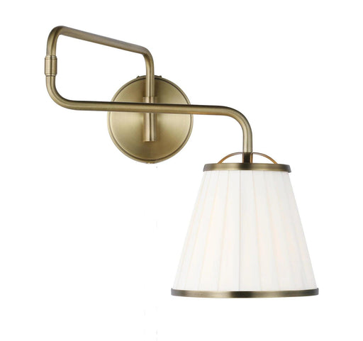 Textured white and brass modern wall light with a spherical glass shade, cropped view.