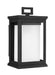 Textured black traditional outdoor wall lantern with clear glass panels.