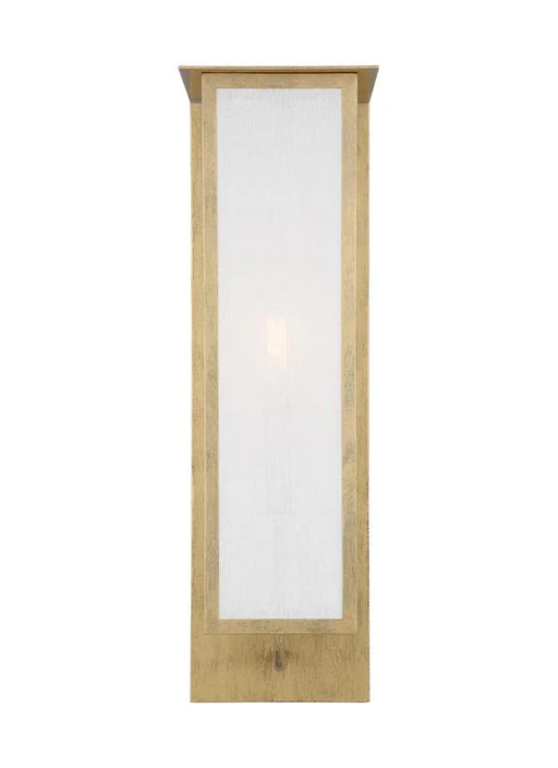 A large round modern flush mount ceiling light with a gold finish and a white diffuser.