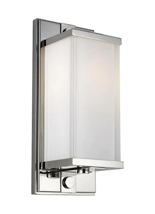 Polished nickel track light with cylindrical heads.