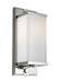 Polished nickel track light with cylindrical heads.
