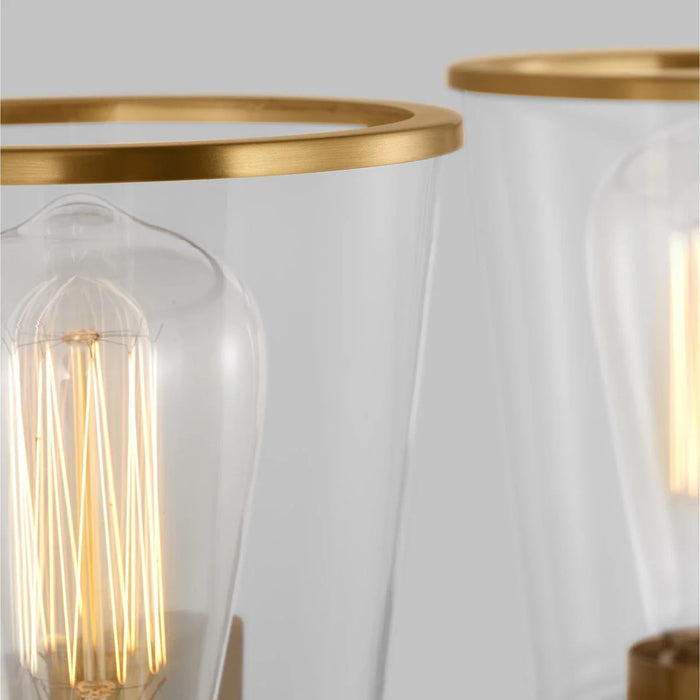 A close-up of a modern brushed steel circular flush mount light.