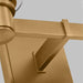 An angled view of a modern brushed steel circular flush mount light.
