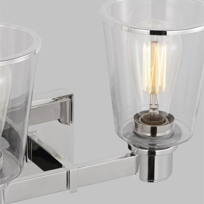 A close-up of a modern polished nickel circular flush mount light.