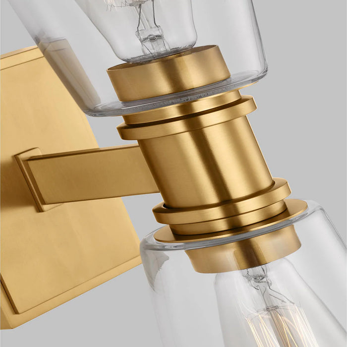 A close-up of a modern brushed steel semi-flush mount light.