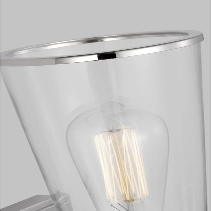 A close-up of a modern polished nickel semi-flush mount light.
