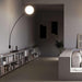 Large, modern wall sconce with a rectangular, metallic frame and a central light bar.