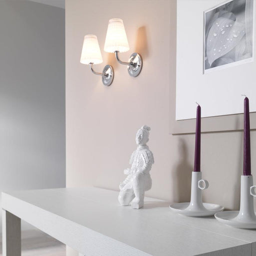 Large, modern wall sconce with a rectangular, metallic frame and a central light bar.