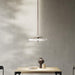 Large, modern wall sconce with a rectangular, metallic frame and a central light bar.