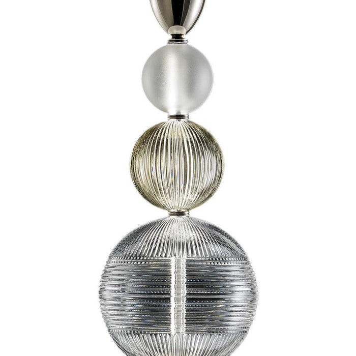 Large, modern wall sconce with a rectangular, metallic frame, side view.