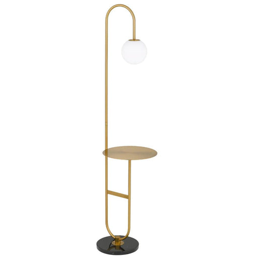 Black and aged gold floor lamp with a cylindrical base and a spherical glass shade.