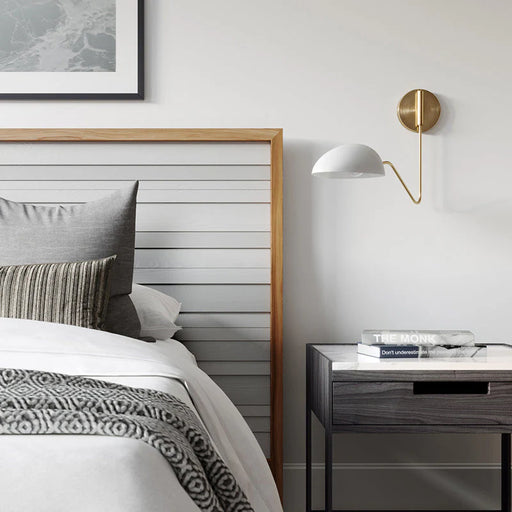 A contemporary white ceiling fan with integrated lighting shown from a slightly angled view.