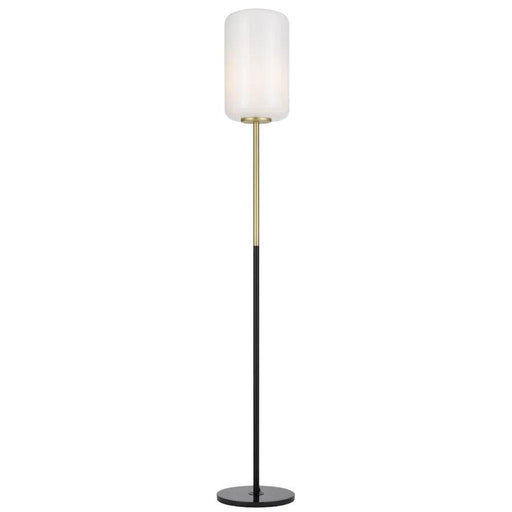 Brass floor lamp with a cylindrical base and an opal glass shade.