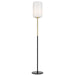 Brass floor lamp with a cylindrical base and an opal glass shade.