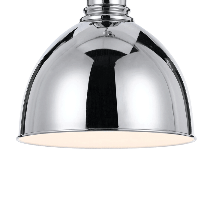 Chrome pendant light with a clear glass diffuser, angled view.