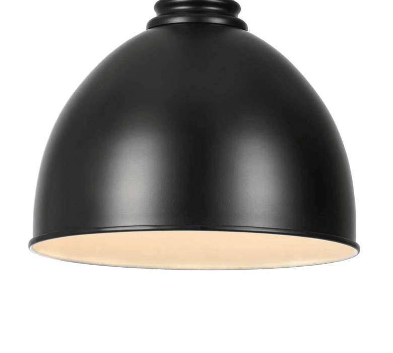 Black pendant light with a clear glass diffuser, angled view.