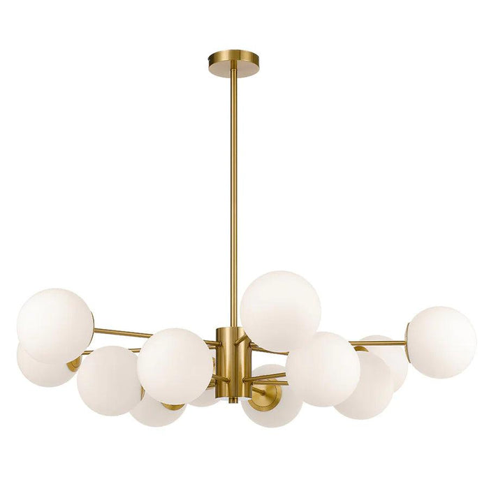 Aged gold pendant light with a cylindrical shade and an opal glass diffuser.