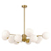 Aged gold pendant light with a cylindrical shade and an opal glass diffuser.