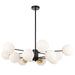 Black pendant light with a cylindrical shade and an opal glass diffuser.