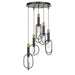 Black and gold five-light linear pendant with spherical frosted glass shades.