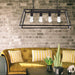 Oil-rubbed bronze pendant light with four clear glass shades, illuminated.