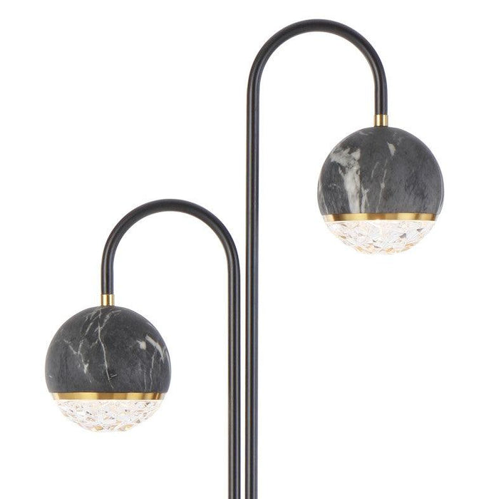 Close-up of the black shade of a floor lamp.