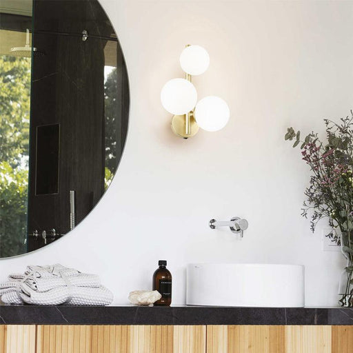 Large, modern wall sconce with a rectangular, metallic frame and a central light bar.
