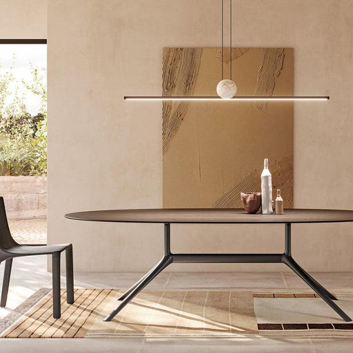 Large, modern ceiling light with a rectangular, metallic frame, angled view.
