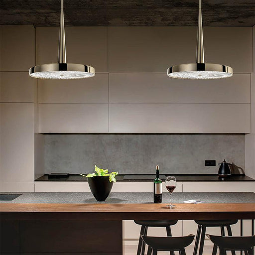 Large, modern wall sconce with a curved, metallic body and upward/downward light.