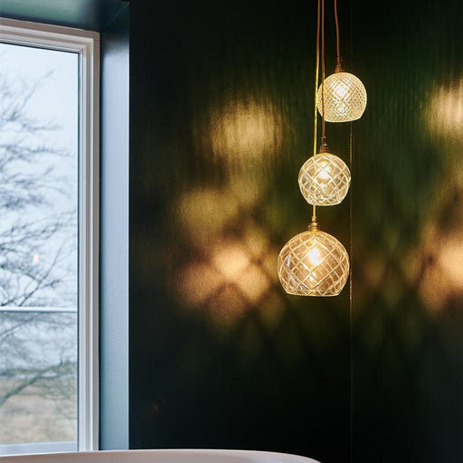 Clear crystal modern chandelier with multiple crystal rods, large size, illuminated.
