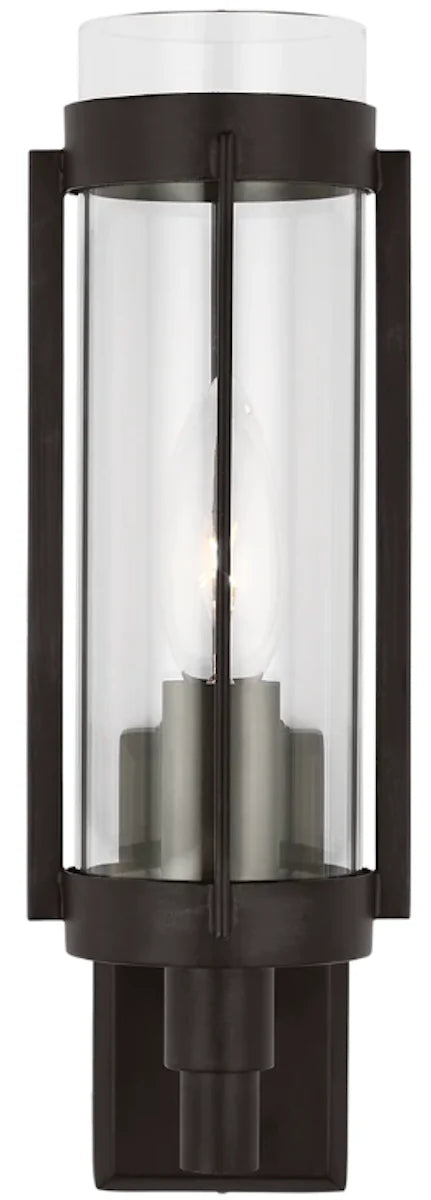 A circular textured flush mount ceiling light with a metallic finish.