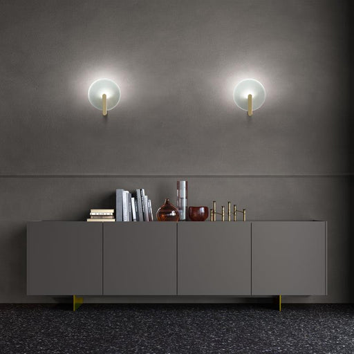 Large, modern wall sconce with a rectangular, metallic frame, angled view.