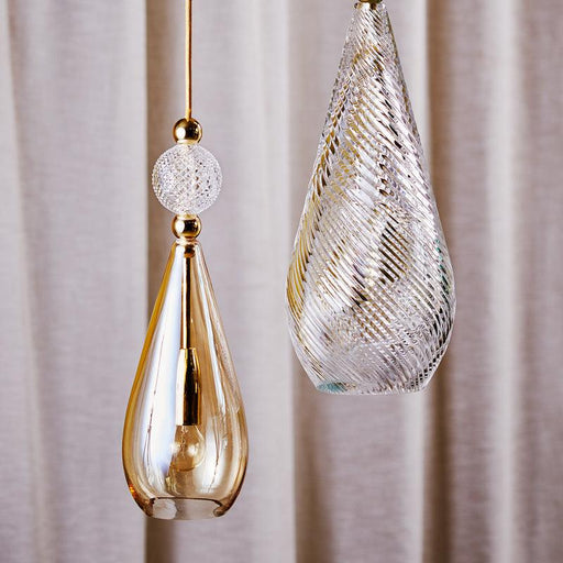 Large, modern wall sconce with a rectangular, metallic frame and a central light bar.