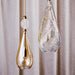 Large, modern wall sconce with a rectangular, metallic frame and a central light bar.